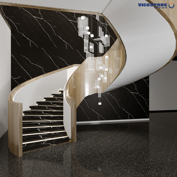 Bậc cầu thang ốp đá đen tia chớp VICOSTONE Nero Marquina hút mắt người nhìn và tạo nên điểm nhấn duyên dáng cho không gian