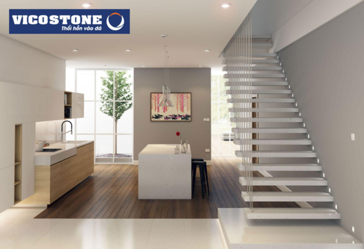 Cầu thang thiết kế bậc đá VICOSTONE Acacia BQ9610 xám  nhạt điểm họa tiết mô phỏng vân gỗ của những thân gỗ lớn trong các khu rừng nguyên sinh, lan can dây cáp mang đến vẻ đẹp tinh tế cho không gian