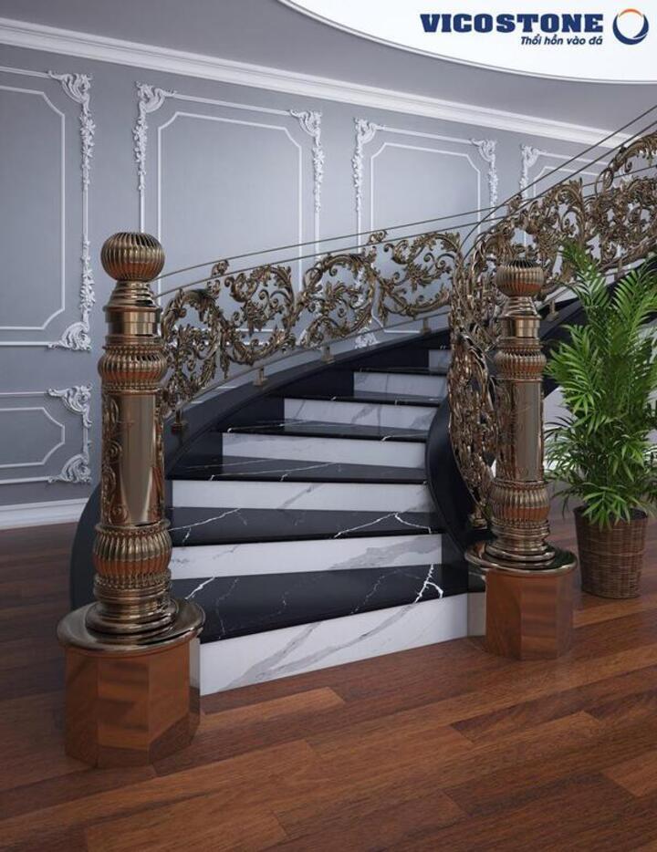 Đá nhân tạo VICOSTONE Arabescato BQ8912 tinh tế và sang trọng với vân xám ấm thanh thoát và VICOSTONE Nero Marquina BQ8740 nổi bật với những đường vân rạn trắng, như những tia sét đánh mạnh mẽ trải dài toàn tấm trên nền đen. Kết hợp với các chất liệu như nhôm đúc, bê tông làm nên vẻ đẹp hoàn hảo và sự chắc chắn cho cầu thang.